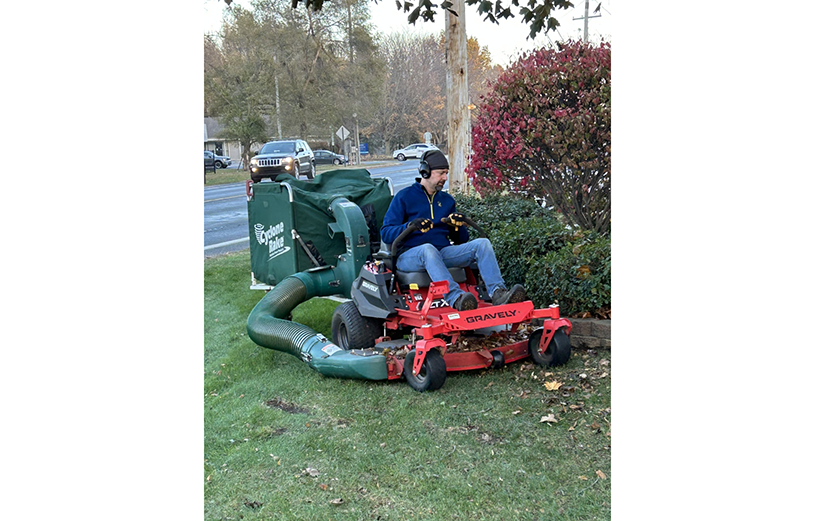 Picking up trash in parking lot