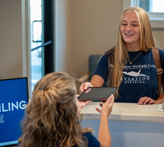 Patient smiling at in-network dentist
